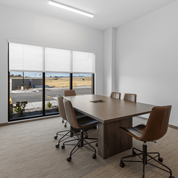Conference room with table and chairs